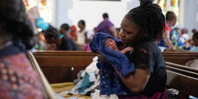 Des migrants africains dans une église méthodiste du Cap, en Afrique du Sud. (ANSA)